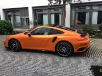 2017-porsche-911-turbo-s-facelift-gets-pearlescent-matte-lava-orange-wrap_2.jpg