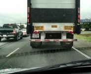 passing-side-vs-suicide-side-sign-on-a-truck.jpg