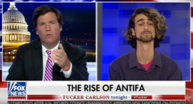 Tucker-Carlson-Michael-Isaacson.sized-770x415xc.jpg